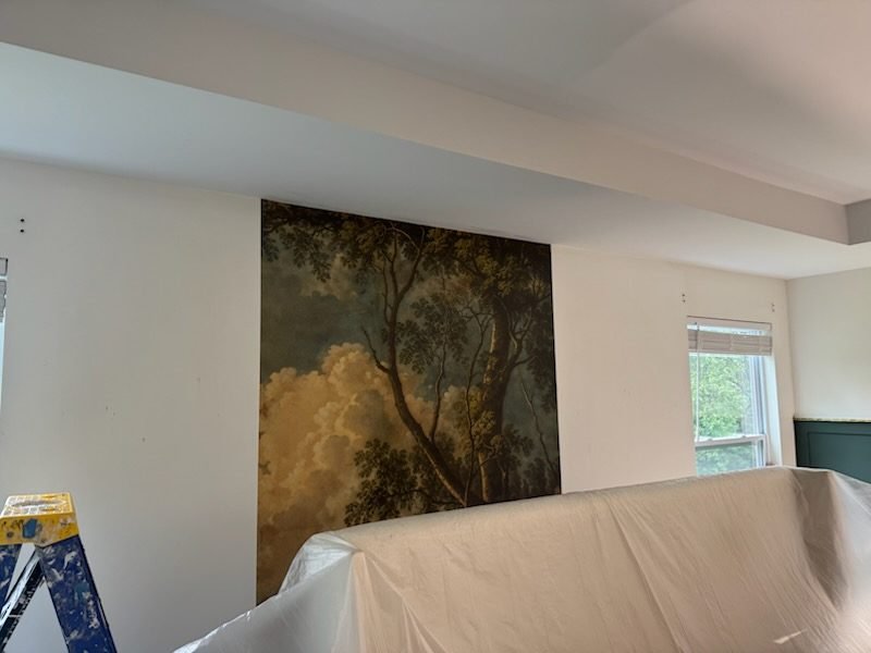Furniture carefully covered and protected during an interior repaint